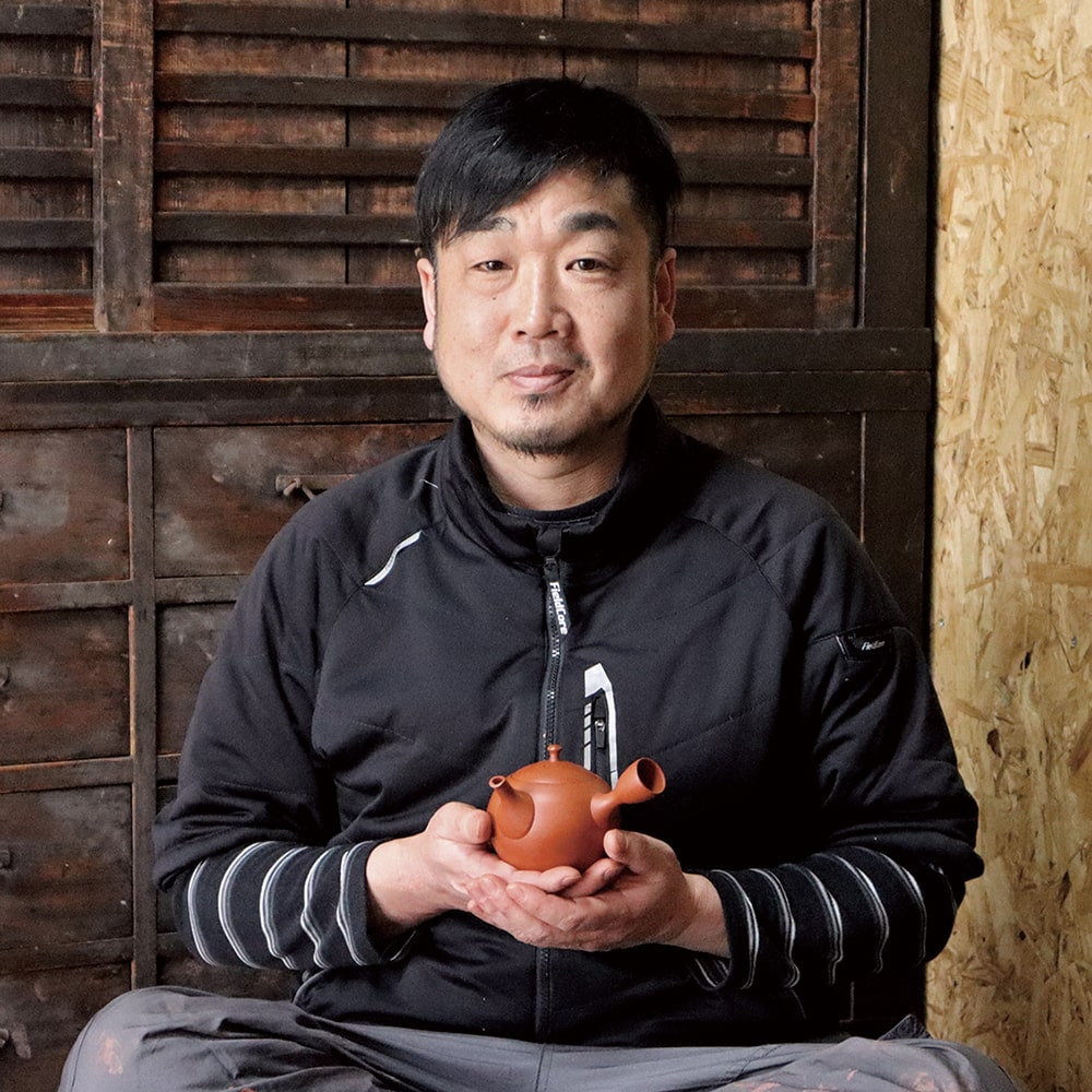 梅原 龍男